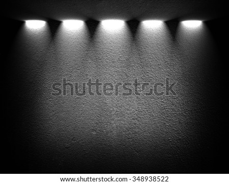 black wall with spotlights