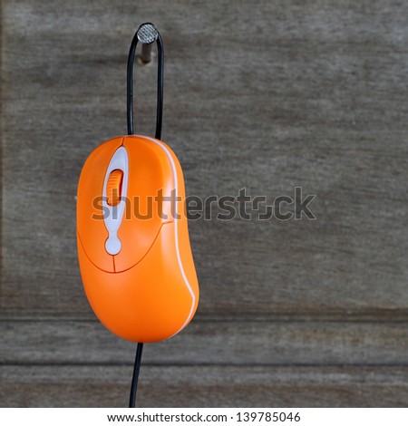 computer mouse on old wood