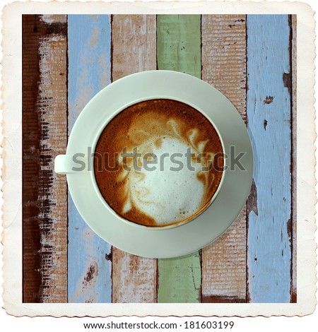 bird eye view of coffee cup on old table