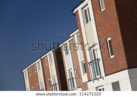 Row of modern 3 storey town houses in UK town