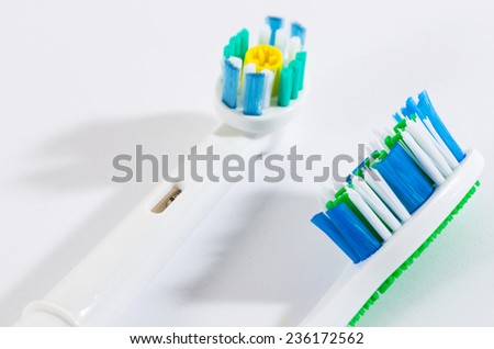 Traditional and modern toothbrush  isolated on white background