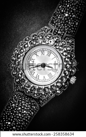 old jewelry woman watch on textured background