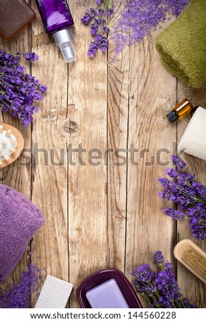 Lavender wellness products on wooden table. Copy space. Top view