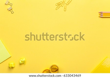 School accessories on yellow background. Minimal style. Flat lay. Copy space. Top view