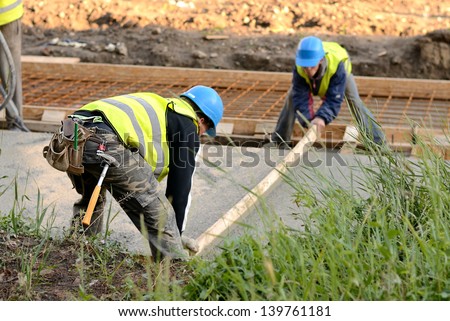 Workers in the road construction