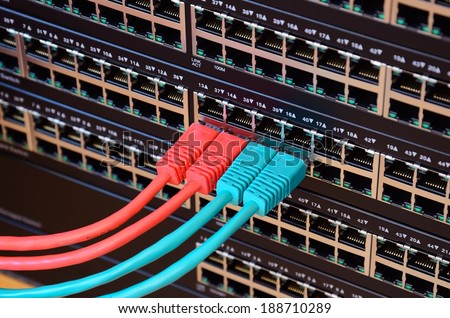 Closeup photo of router with connected network cables