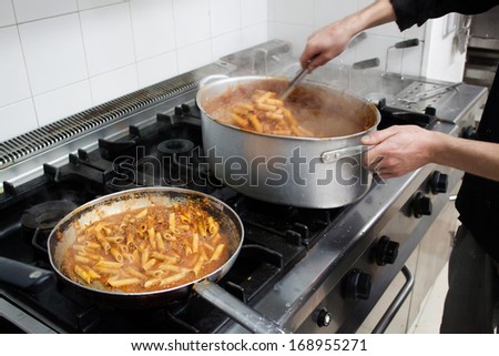 Industrial kitchen. Cooking pasta