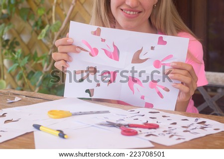 Woman making traditional Danish Easter letters