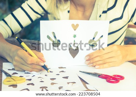 Woman making traditional Danish Easter letters