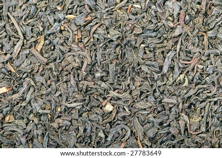Black leaf tea close-up background pattern texture