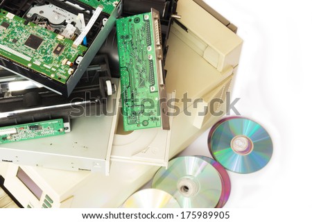 Electronic waste ready for recycling. Old computer parts on white background.