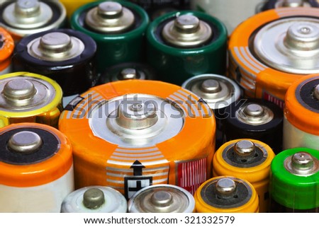Group of Old AA, AAA and C Batteries in Closeup. Selective Focus.