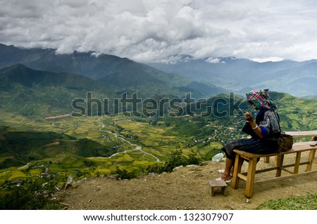 MUCANGCHAI, VIETNAM - SEPTEMBER 23: Hmong Ethnic Minority woman are sewing on September 23, 2012 in Mucangchai, Vietnam. H\'mong are the 8th largest ethnic group in Vietnam.