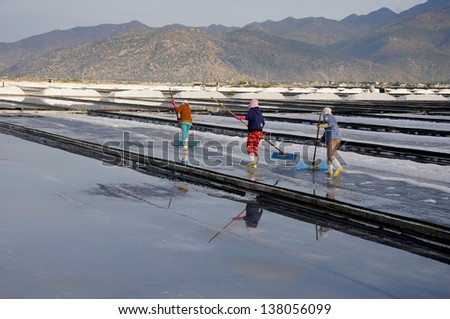 People work in salt farm in Vietnam