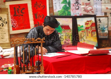 Hanoi, Vietnam, February 14: Old Master Is Writing Ancient Letter For Everyone In Lunar New Year On February 14, 2013 In Hanoi, Vietnam. This Is A Tradition Of Vietnamese People In Lunar New Year