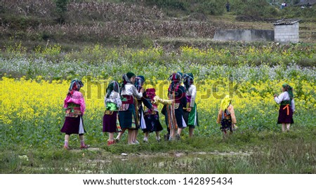 HAGIANG, VIETNAM, FEBRUARY 15: Unidentified ethnic minority people go to traditional spring festival on February 15, 2013 in Hagiang, Vietnam. Hagiang is a northernmost province in Vietnam