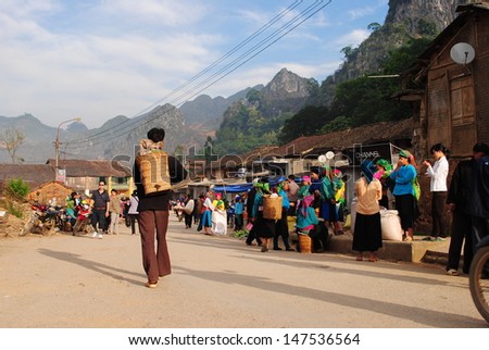 HAGIANG, VIETNAM, APRIL 30: Unidentified ethnic minority people in a traditional market on April 30, 2011 in Hagiang, Vietnam. Hagiang is a northernmost province in Vietnam