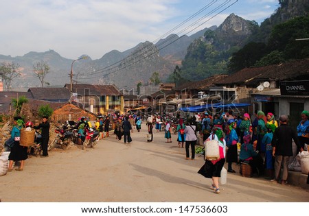 HAGIANG, VIETNAM, APRIL 30: Unidentified ethnic minority people in a traditional market on April 30, 2011 in Hagiang, Vietnam. Hagiang is a northernmost province in Vietnam