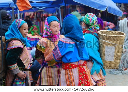 LAOCAI, VIETNAM, FEBRUARY 10: Unidentified ethnic minority women in a traditional market on February 10, 2012 in Laocai, Vietnam. There are many ethnic minority groups in Laocai