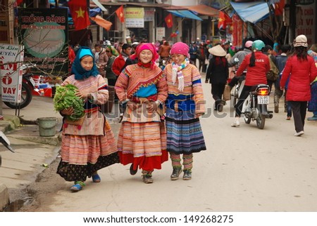 LAOCAI, VIETNAM, FEBRUARY 10: Unidentified ethnic minority women in a traditional market on February 10, 2012 in Laocai, Vietnam. There are many ethnic minority groups in Laocai