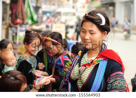 LAOCAI, VIETNAM, SEPTEMBER 2: Unidentified ethnic minority woman in a traditional market on September 2, 2010 in Laocai, Vietnam. There are many ethnic minority groups in Laocai