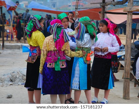 HAGIANG, VIETNAM, OCTOBER 20: Unidentified ethnic minority girls in a traditional market on October 20, 2011 in Hagiang, Vietnam. Hagiang is a most northern province in Vietnam.
