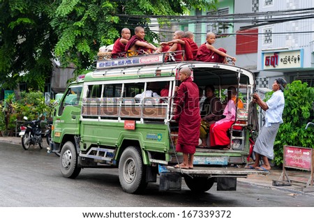 Mandalay, Myanmar, September 2: Unidentified Burmese Monks In A Truck On September 2, 2013 In Mandalay, Myanmar. Truck Is A Popular Transportation In Myanmar Because It Can Carry Many People.