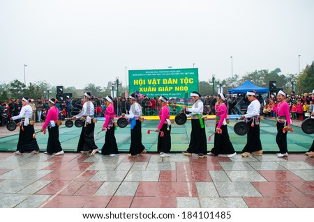 HANOI, VIETNAM, FEBRUARY 16: Muong ethnic minority artists perform traditional dance on February 16, 2014 in Hanoi, Vietnam. Muong is a one of ethnic minority group in Vietnam