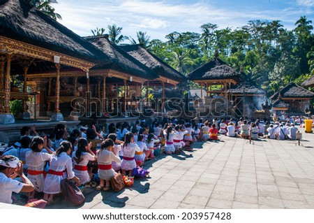 BALI, INDONESIA, APRIL 10: People praying in Turta Empul temple on APRIL 10, 2013 in Bali, Indonesia. Turtal Empul temple is one of the most famous hindu temple in Bali island