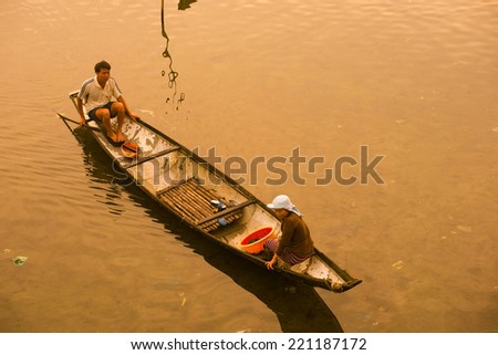 HUE, VIETNAM, MAY 2: Unidentified fishing man go home from boats on May 2, 2014 in Hue, Vietnam. Hue, a UNESCO World Heritage site.