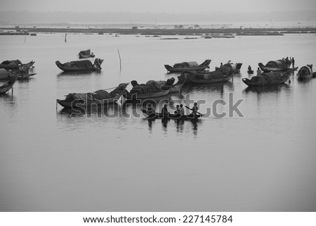 HUE, VIETNAM, MAY 2: Unidentified people on the boats in Pha Tam Giang lagoon on May 2, 2014 in Hue, Vietnam. Hue, a UNESCO World Heritage site.