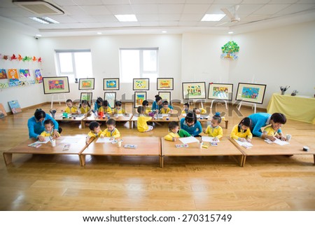 Hanoi, Vietnam, December 23, 2014 unidentified children study painting in kidergarten school students in Hanoi, Vietnam