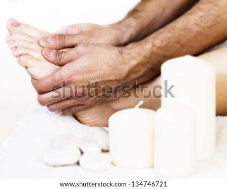 Physiotherapist massaging with fingers in a health center