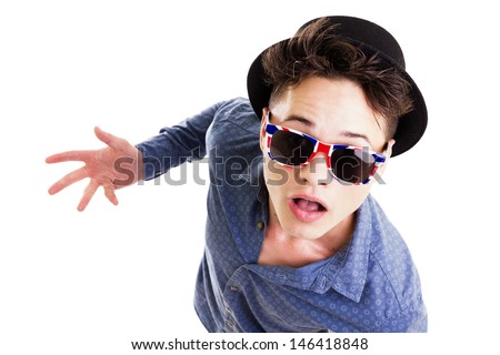 Confused young man wearing sunglasses, open mouth, raised eyebrows, hand gesture, hslf body, close-up, isolated on white