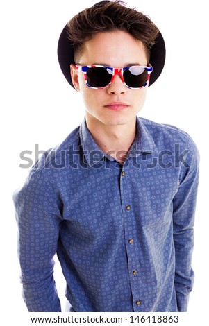 Young man with sunglasses portrait, hands in pockets, half body, close- up, isolated on white