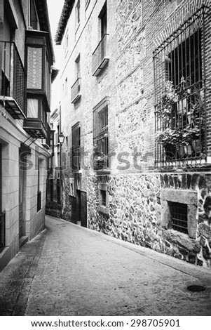 View from Toledo in Spain. UNESCO sightseeing, medieval architecture, houses. Black & white picture.