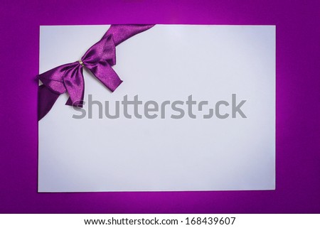 Gift certificate,Coupon, with purple bow (ribbons). violet background