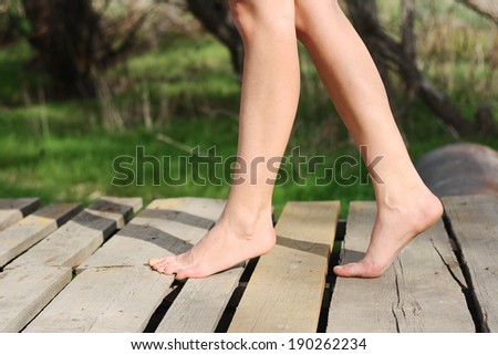 beautiful woman walking without shoes sunny day beautiful woman walking without shoes sunny day
