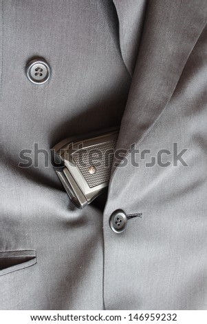 Pistol in suit pocket