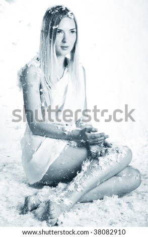 lovely angel with feathers on white background