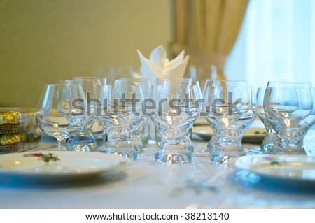 Table with tablewares covered by a holiday