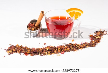 Fruit Tea With Tea Egg, Cinnamon And A Slice Of Orange