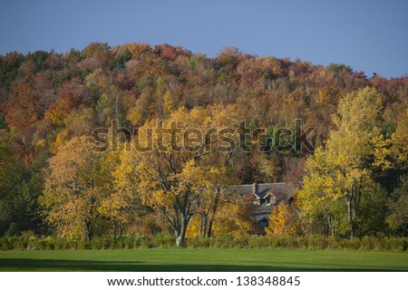 Trapp Family Lodge surrounded by fall foliage, Stowe, Vermont, USA
