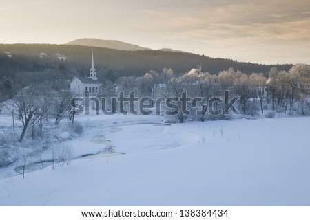Sunrise over Stowe Community Church on a cold winter morning, Stowe, Vermont, USA