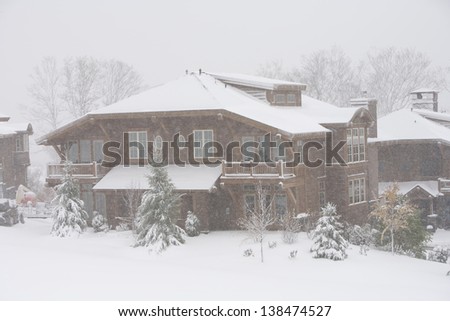Mountain villas during a snow storm, Stowe, Vermont, USA