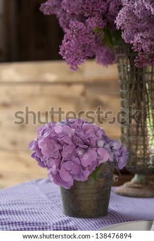 Floral bouquet in a barn setting.