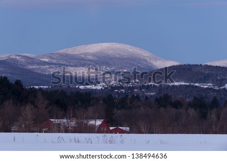 Early winter morning with Trapp Family Lodge nestled in the hills of Stowe, Vermont, USA