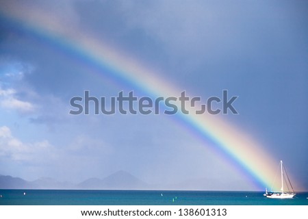 The end of a rainbow over a sailboat, St. John, USVI
