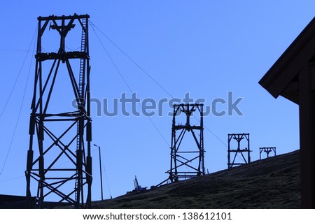 Silhouette of old deserted mining transfer towers in Longyearbyen, Svalbard Norway.
