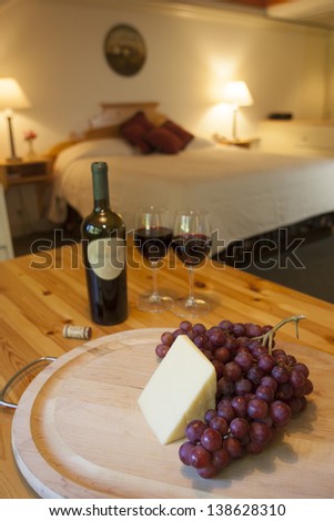 Wine, cheese and grapes for a snack in a upclass hotel room, Stowe, Vermont, USA